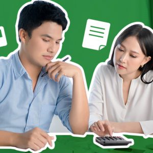 Asian Man and Woman computing taxes